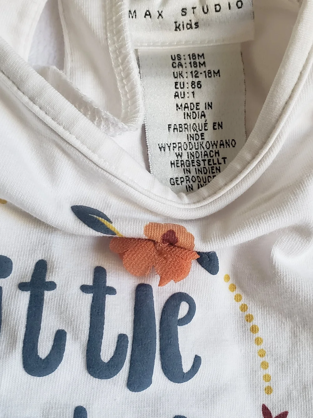 Max Studio Kids White Bodysuit with Navy Script and Rust Floral Accent